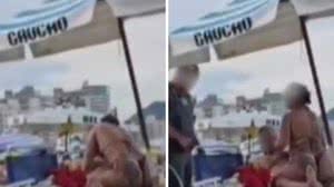 PM interrompe 'esfrega esfrega' de casal em areia de praia - Reprodução / Redes sociais