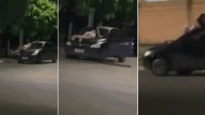 Mulher se agarra a para-brisa de carro para tentar impedir marido de fugir com filha - Reprodução