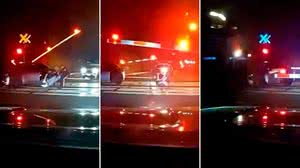 Polícia resgata motorista bêbado momentos antes de trem atingir o carro - Reprodução / Polícia de Piscataway