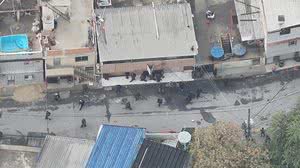 Mais de 2.500 policiais invadiram o Complexo do Alemão e da Penha, que deixou 121 mortos e mais de 100 presos - Reprodução