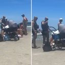 Imagem Vídeo: PM pede para pais tirarem bebê da praia e cena gera revolta