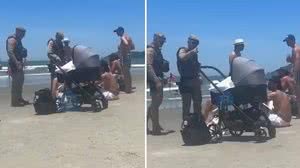 Imagem Vídeo: PM pede para pais tirarem bebê da praia e cena gera revolta