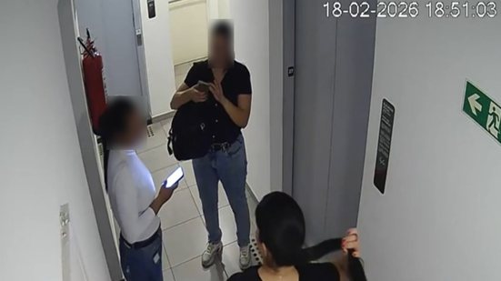 Câmera de segurança registra entrada e saída de 3 policiais de apartamento em que PM foi morta com tiro na cabeça - Reprodução / TV Globo