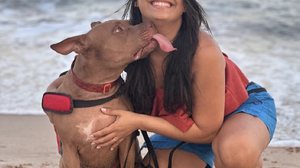 Emely e Zeus na praia - Arquivo pessoal