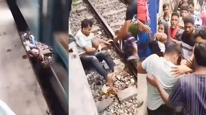 Pai pula nos trilhos de trem para salvar filho em Bhairab, em Bangladesh, em 28 de abril de 2026 - Reprodução / Redes sociais