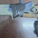A PM apreendeu uma imitação de pistola e um facão no local do sequestro - Divulgação / PM