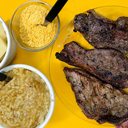 Imagem Arroz de tempero é a estrela do Espetinho do Samuel