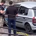 Oficiais do Instituto de Criminalística fazem a perícia do carro onde foram encontradas as duas meninas, de 3 e 5 anos, próximo ao terminal Varginha, na zona sul de São Paulo - Reprodução