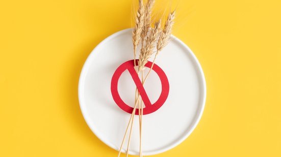 Doenças relacionadas ao glúten podem causar sintomas digestivos (Imagem: Galigrafiya | Shutterstock)