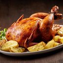 Frango assado com batata (Imagem: MaraZe | Shutterstock)