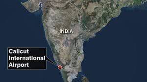 Imagem Avião se parte em dois durante pouso no sul da Índia e deixa ao menos 15 mortos