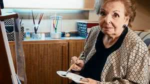 Nessa foto, exibida no Domingão, ela estava com sua aquarela. Dona Cordélia voltou a pintar em 2012, incentivada por Fausto Silva | Foto: Divulgação