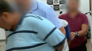 Os suspeitos detidos | Reprodução/Record TV