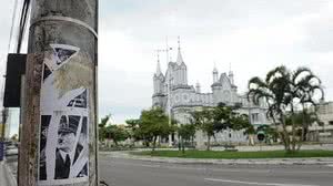 Cartazes foram distribuídos no Centro de Itajaí | Rafaela Martins / NSC Total