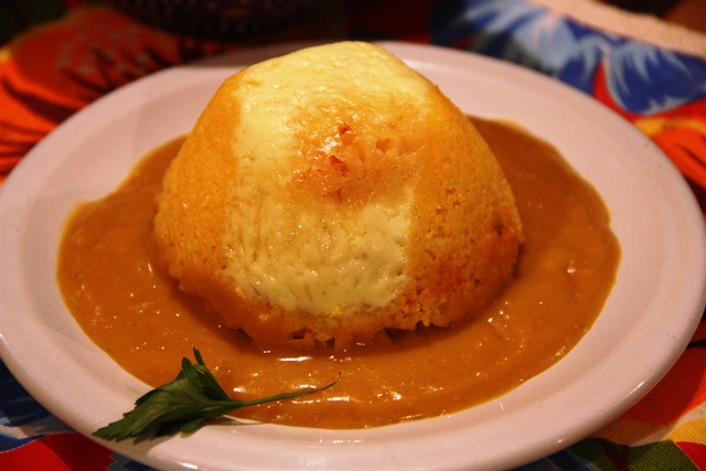 Cuscuz de bobó de camarão. Detalhe o crustáceo está escondido.