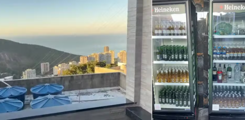 Vista do terraço e geladeira cheia no prédio do tráfico da Rocinha
