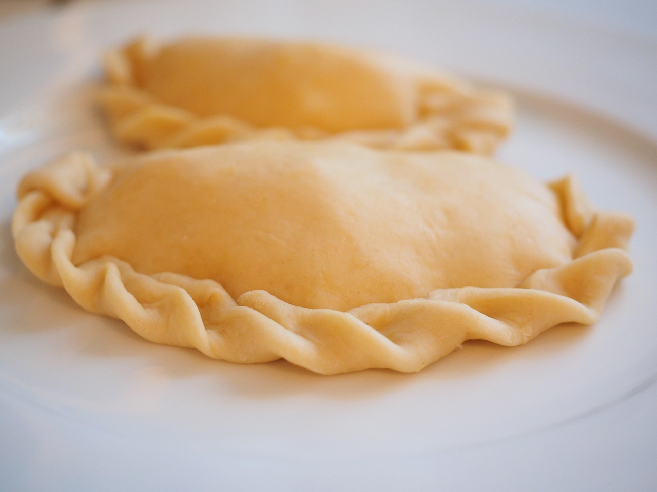 empanadas, dumplings, comida, refeição, em forma de crescente, preenchido, especialidade, espanhol, mexicano, argentina, filipino