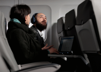 Por que não se pode simplesmente mudar para um assento de avião vazio de graça