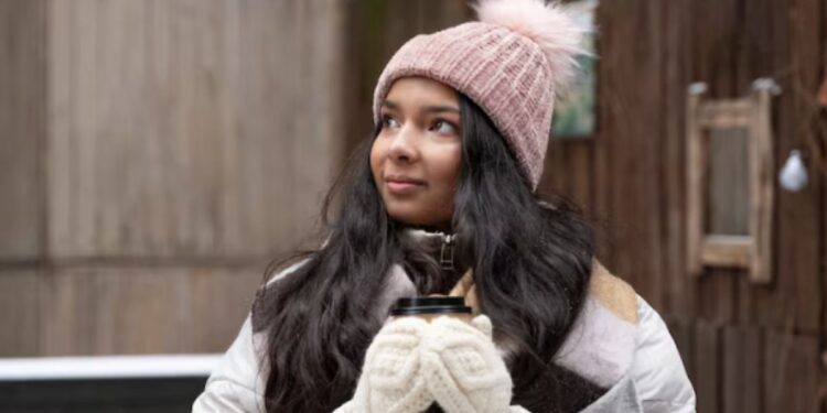 Mulher com roupa de frio